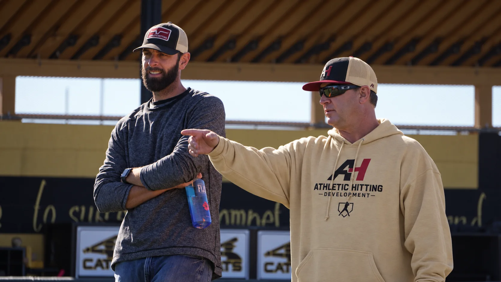 BK coaching on the field in an AHD hoodie