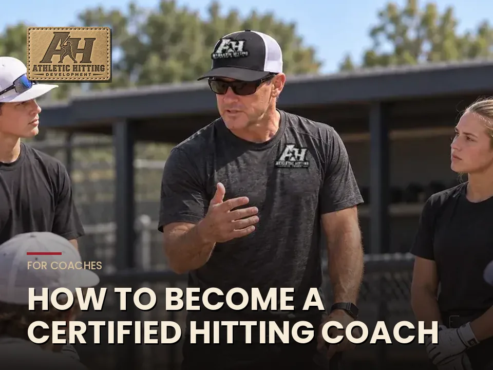 Hitting coach teaching a group of players on the field