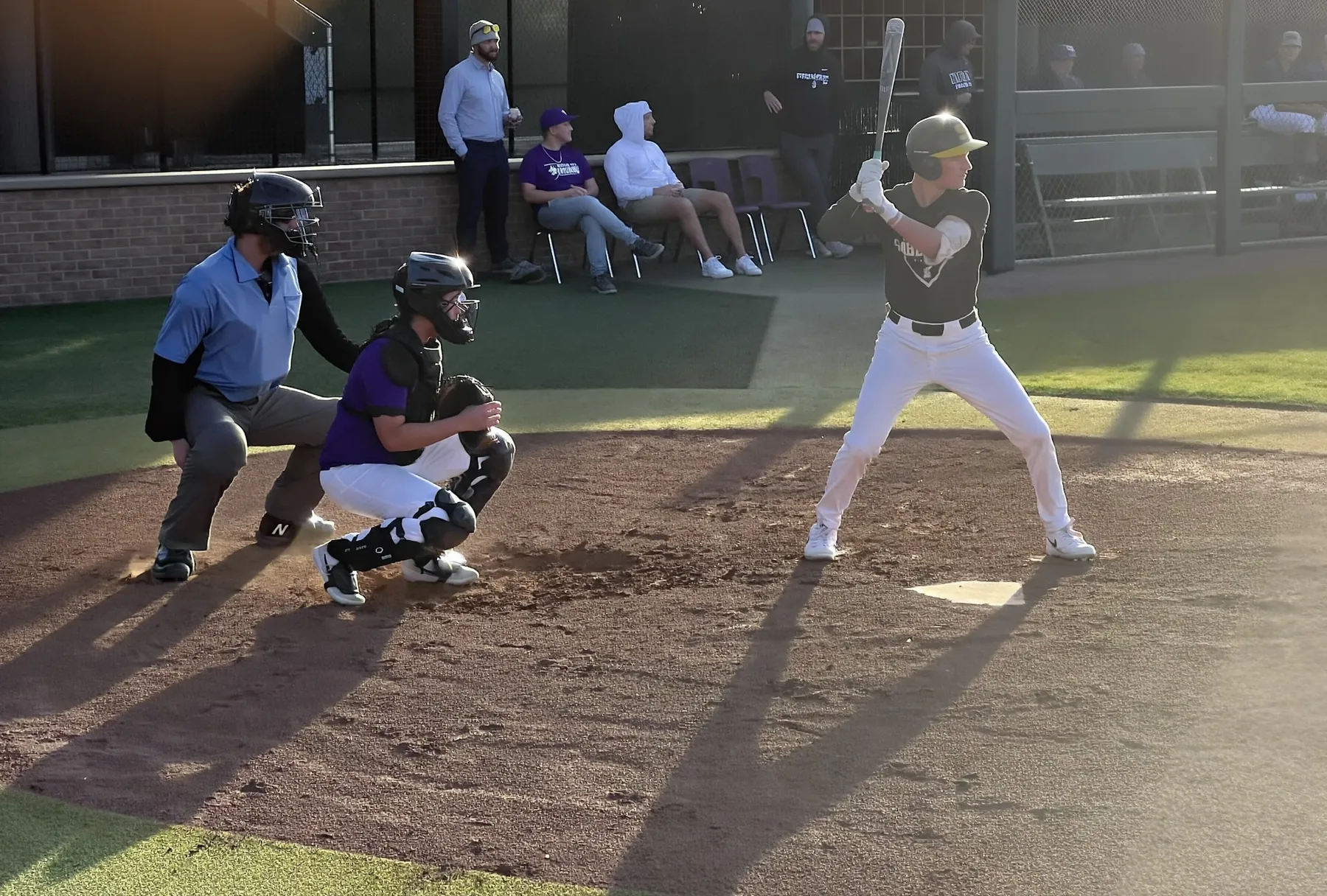 AHD hitter in the box at golden hour, ready to hit