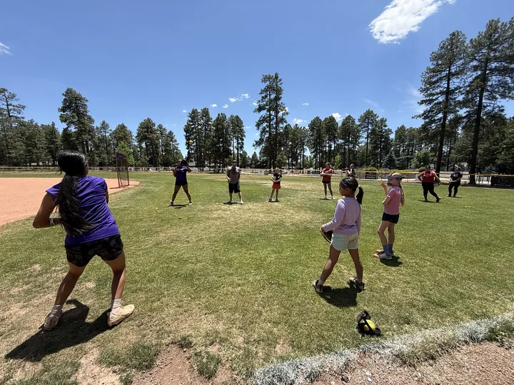 Softball camp catch play in the pines