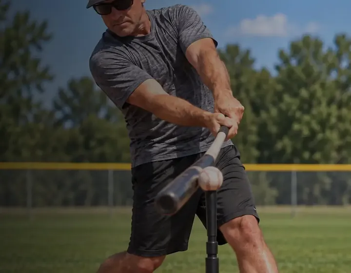 Hitter swinging off a tee